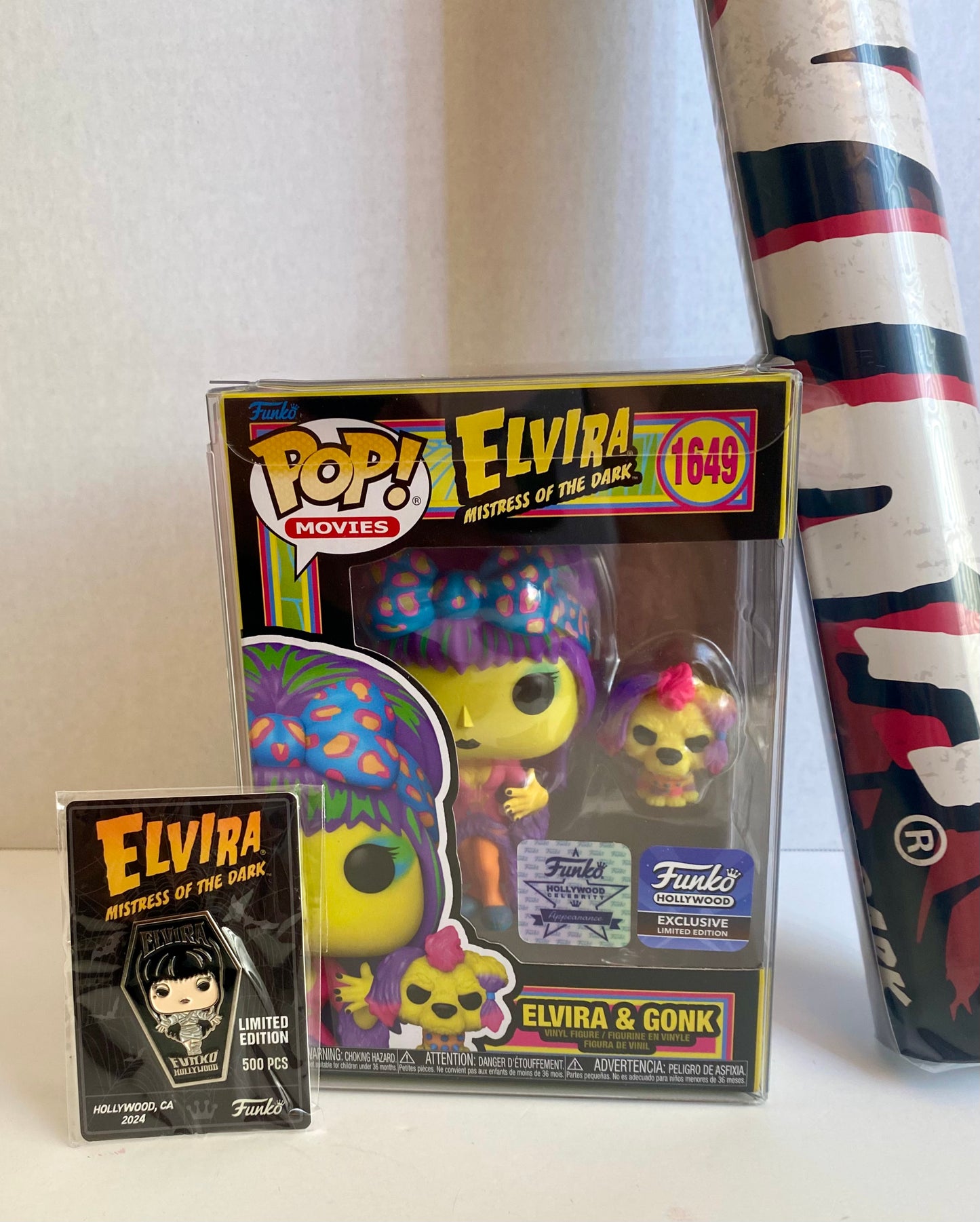 Funko Pop! Elvira & Gonk Blacklight Hollywood Exclusive with Celebrity Sticker Funko Pin & Poster